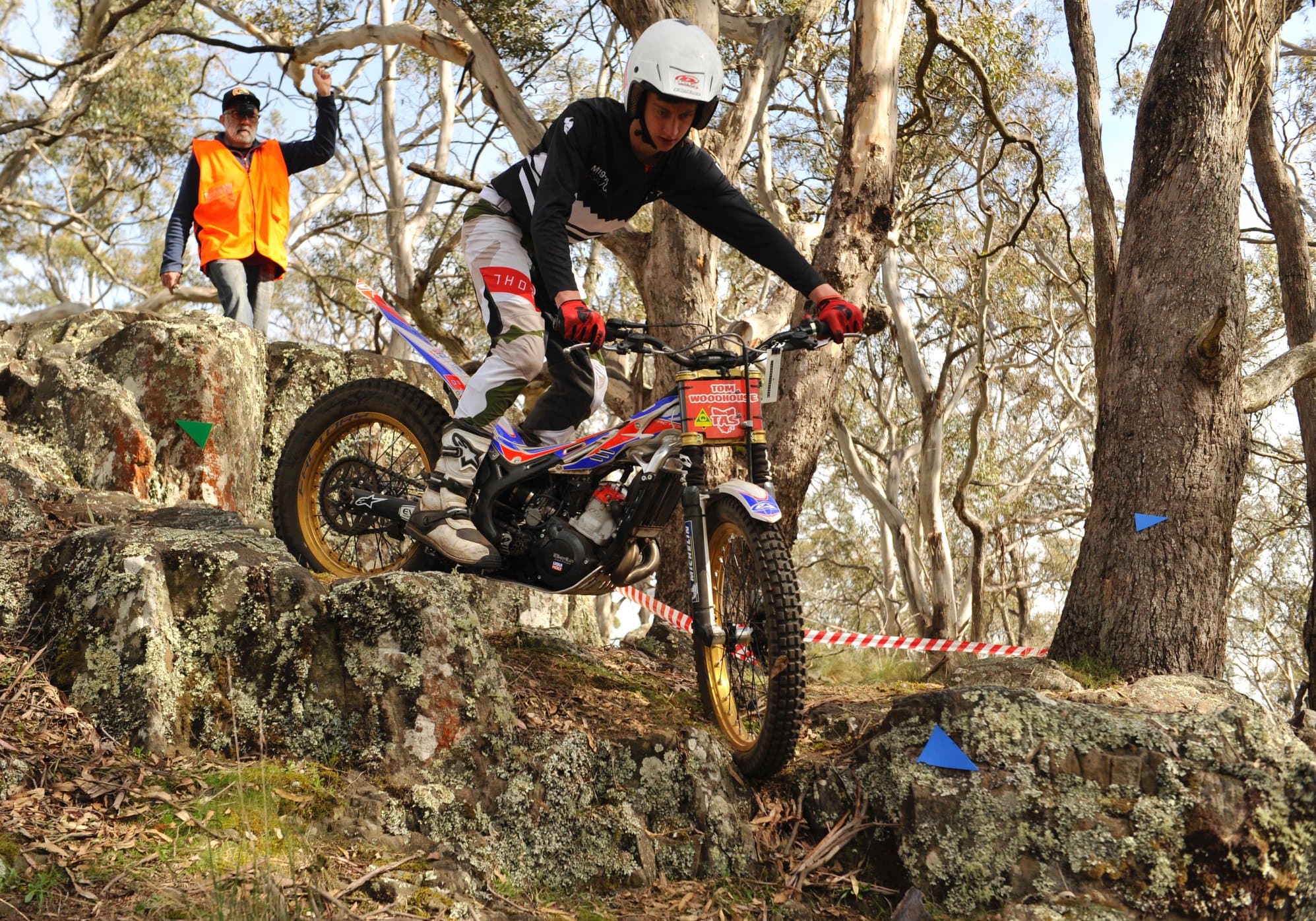 Observer scoring a rider at a trials section