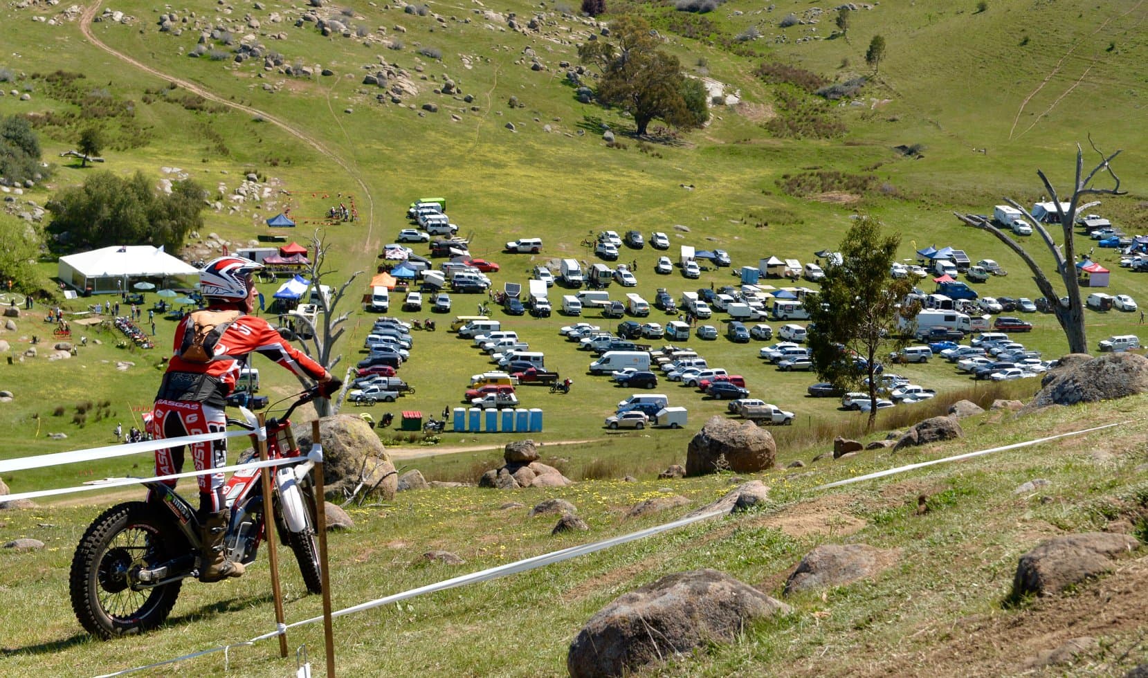 Motorcycle trials rider surveying a section before competing at an Australian event